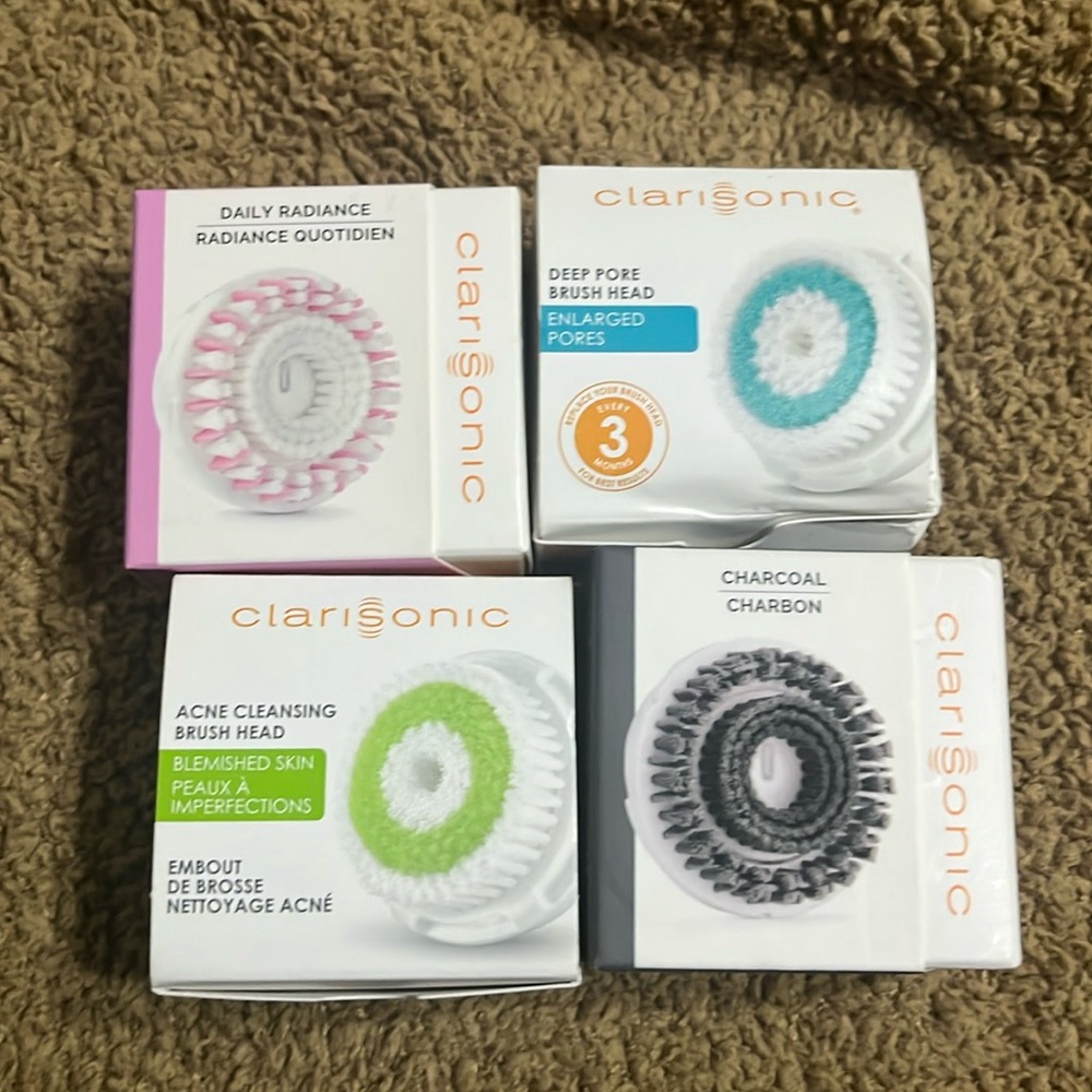 NIB. 4 pack-Clarisonic. Charcoal, acne, deep pore & daily radiance brush heads